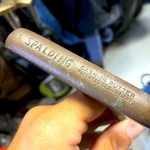 Vintage Spalding cash in putter. 
Double sided